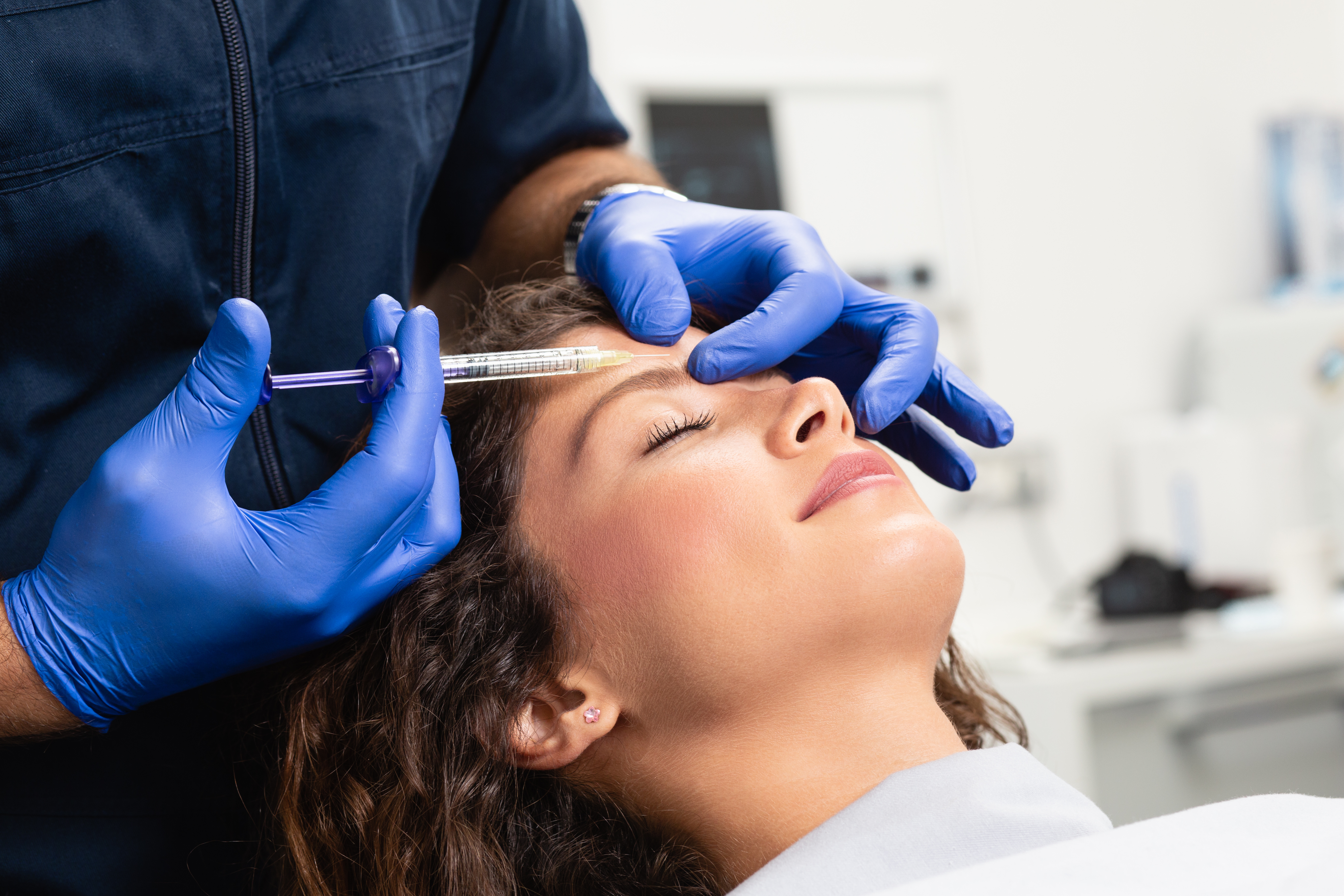 Woman receiving forehead Botox treatment